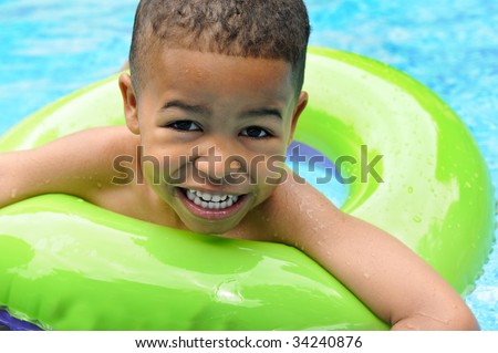 African American boy in swimming pool