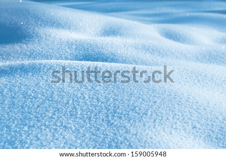 Winter background of shiny snow