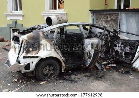 TERNOPIL, UKRAINE- FEBRUARY 18: Result of assault of city police department by activists Ukrainian revolution on February 18, 2014 in Ternopil, Ukraine. Protestants burned police department and cars.