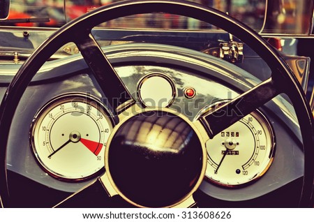 Retro car steering wheel and speedometer with datchykamy.Retro style.