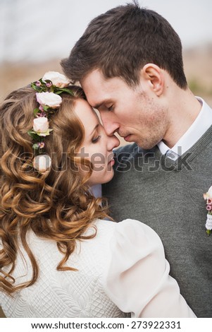 wedding couple in love. close up portrait of beautiful woman and man. bride and groom. wedding ceremony. close up portrait of people in love