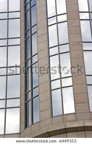 Photo of an office tower\'s facade.