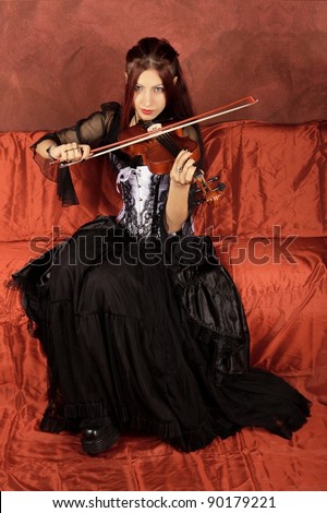 stock photo Classic violin instrument Gothic Musician Gothic girl play 