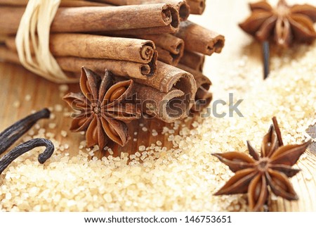 Cinnamon sticks, brown sugar, anise stars and vanilla beans