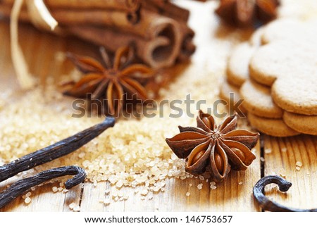 Cinnamon sticks, brown sugar, anise stars and vanilla beans