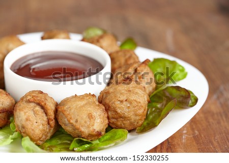 Meatball appetizers with a dipping sauce