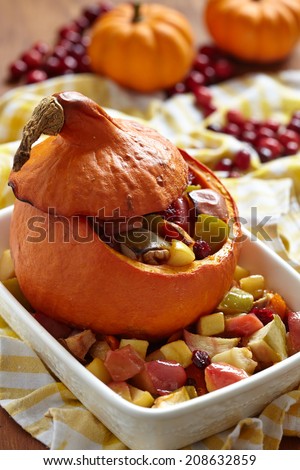 Dessert Stuffed pumpkin with fruits for Thanksgiving