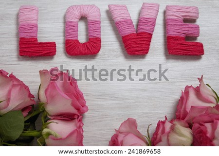 Valentine's day concept with letters love and flowers