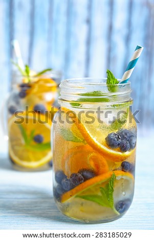 Orange Blueberry Detox Water on wooden table
