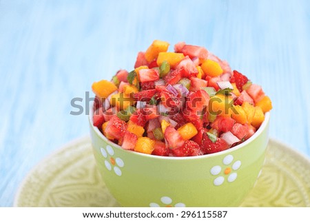 Fresh strawberry mango salsa with corn chips