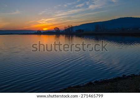 sunrise on the lake sky sun water waves