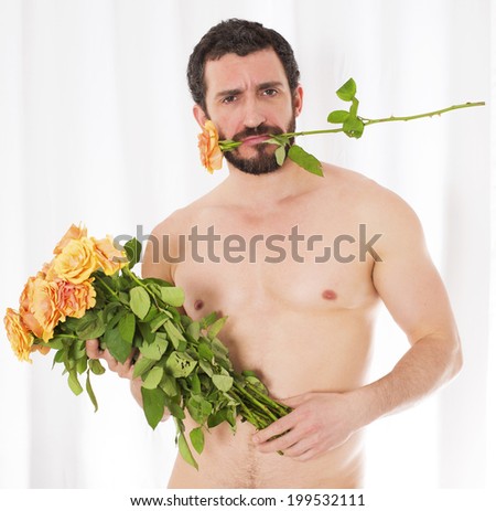 portrait of a latin man holding a bouquet of roses and one rose in his mouth