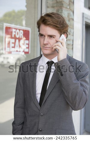 man in front of a store with a \