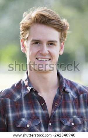 portrait of a handsome man in a flannel shirt