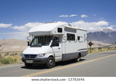 RV driving to Great Sand Dunes National Park in Colorado.