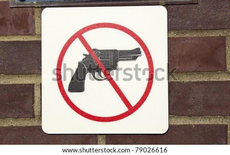 No guns permitted - sign saw on the wall
