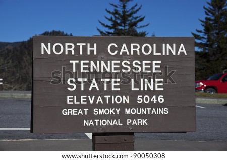 Tennessee - North Carolina state line. The sign in Smoky Mountains by Appalachian Trail.
