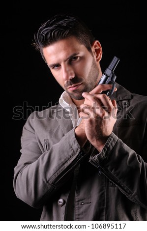 Gangster or private security or detective with a gun