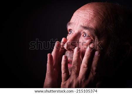 old man looking frighten or scared