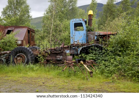 old rusty truck in junk yard