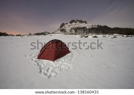 tent in the snow on a cold night
