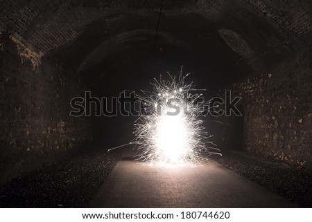 firework in a dark tunnel