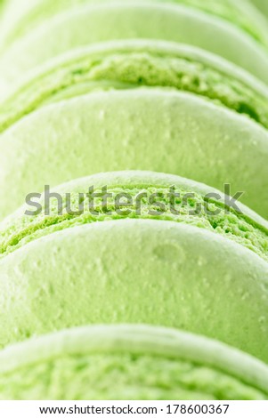 Food: fresh green macarons, close-up shot, food background or wallpaper