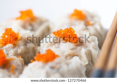 shumai Chinese dumpling dim sum yumcha made from shrimp, fish and chicken with salmon egg
