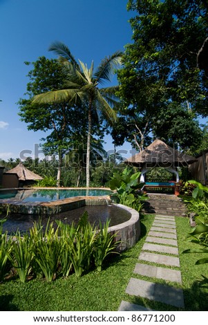 Resort Style Swimming Pool With Small Shack In Tropical Garden ...