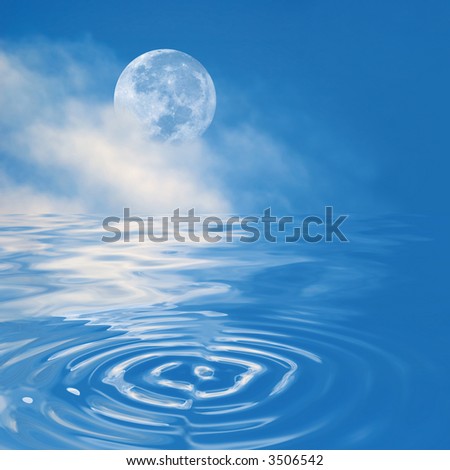 full moon in blue sky with water reflection