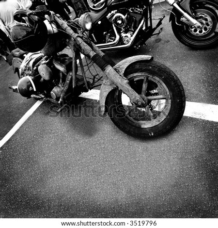 motorbikes in black and white on asphalt to use as background or cd cover