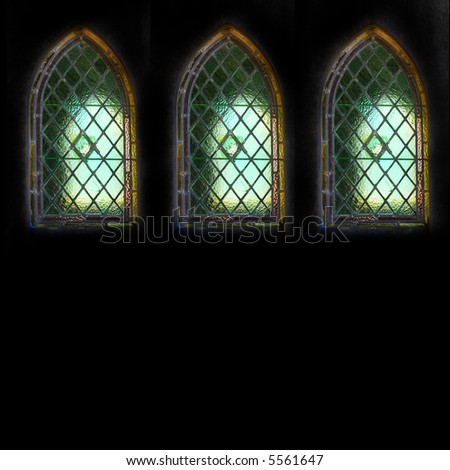 leaded lights quarrel windows in old weathered family grave isolated on black