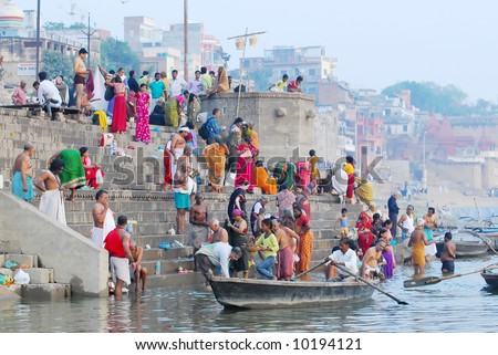 colorful hindu people bathing in the ganges river in varanasi