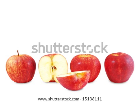 Red apples and one cut in half lined up on white background (4 in a row)