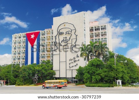 Ministry of the Interior building, featuring iron mural of Che Guevara\'s face at the Revolution Square in Havana, Cuba