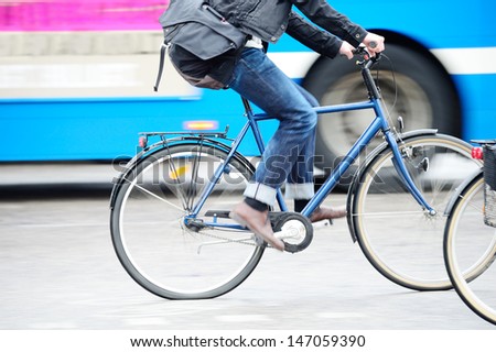 Man on bike in traffic