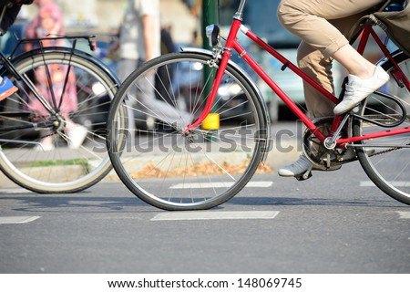 Two bicycles in traffic