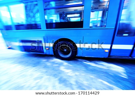 Ice cold motion blurred bus on winter street