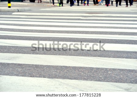 Pedestrians on zebra crossing, out of focus