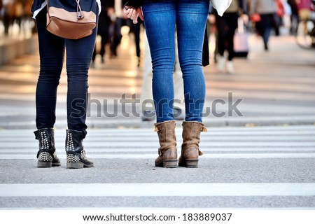 Pedestrians waiting to cross street