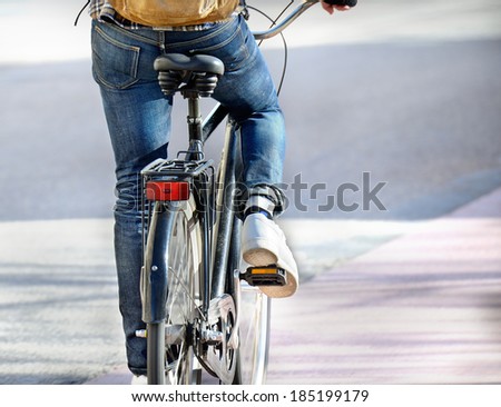 Man on bike on his way home