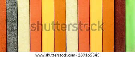 Close-up of title-less books in bookshelf