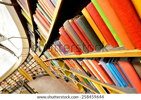 Close up of bookshelves. Interior blurred.