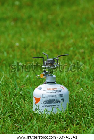 portable camping stove with a butane/propane gas canister
