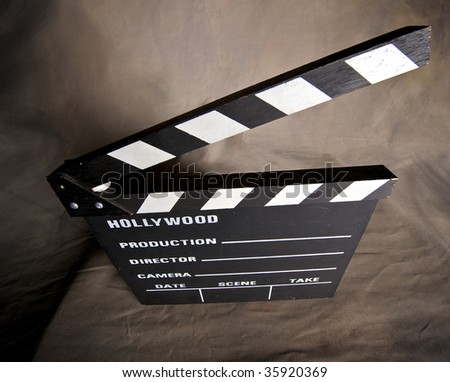 A movie production clapstick board.