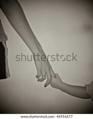 The small daughter holds mum by the hand on a decline