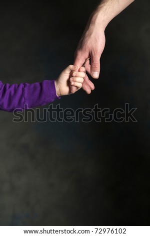 father giving hand to a child