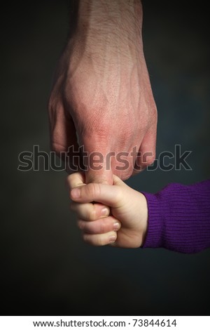 father giving hand to a child