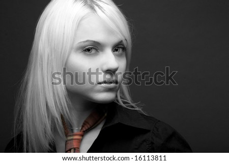 Black and White portrait of a beautiful girl on a gray background