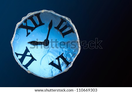 Design clock with water on black background